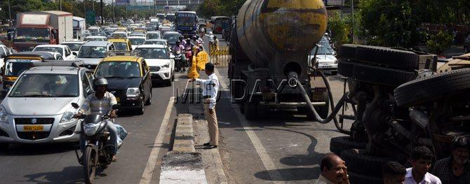 Mumbai: Traffic snarls at Kherwadi signal after cement container turns turtle