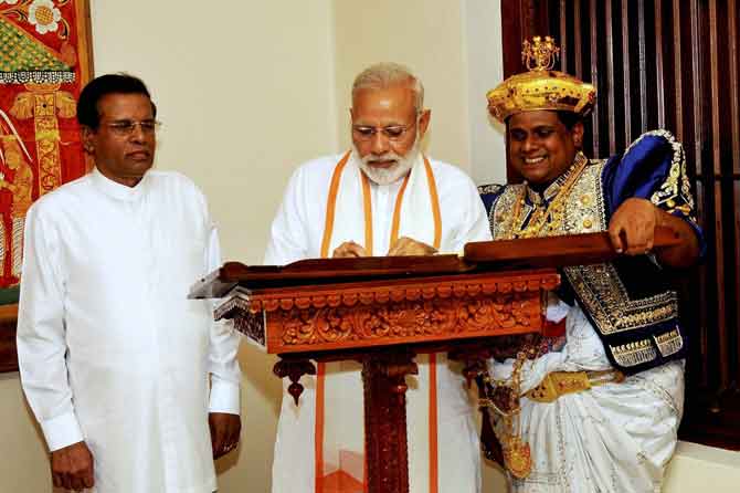 Modi makes veiled reference to terrorism from across the border at Vesak Day