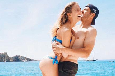 Real Madrid's Morata and fiancee Alice Campello get mushy on their holiday