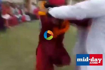 Watch video: Swami Om gets beaten up in public