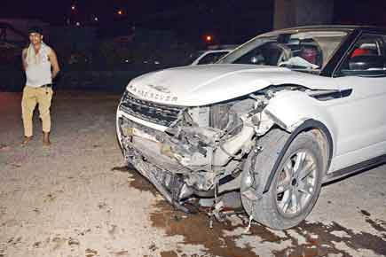 Mumbai accident: Car turns turtle after speeding Range Rover crashes into it