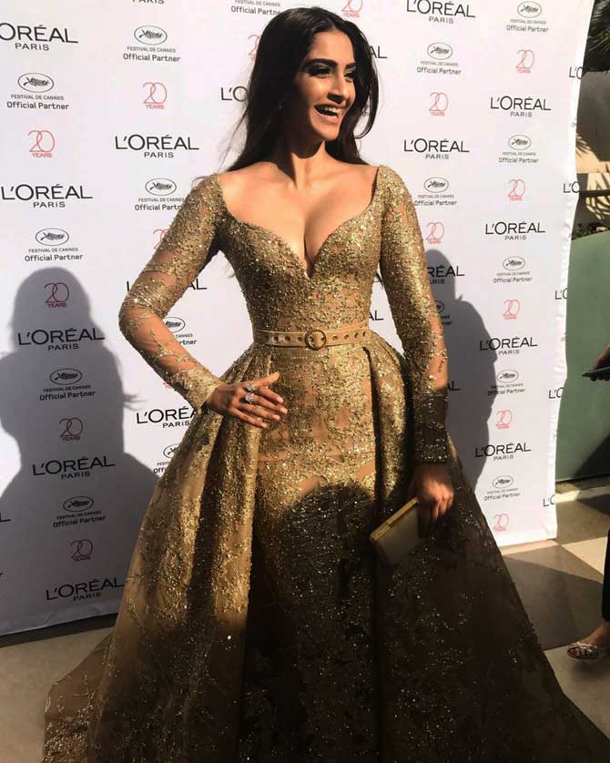 Sonam Kapoor looks radiant in a gold Elie Saab gown