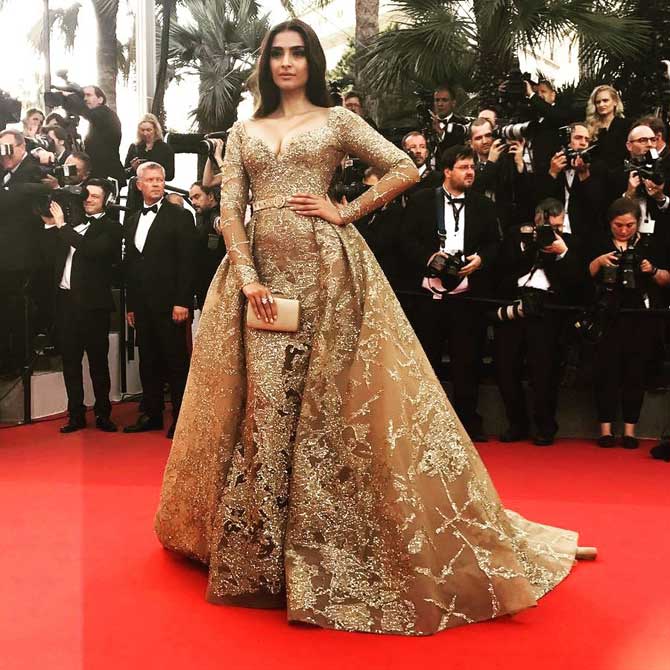 Sonam Kapoor poses for photographers on the red carpet before attending the screening of The Meyerowitz Stories