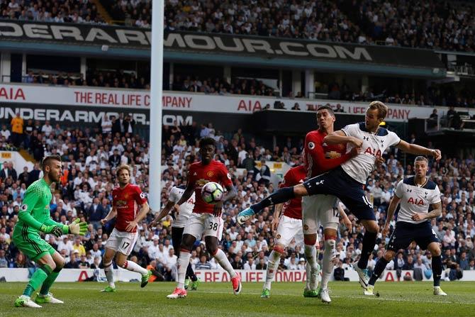 Harry Kane (R) scores the second goal during the English Premier League football match between Tottenham Hotspur and Manchester United
