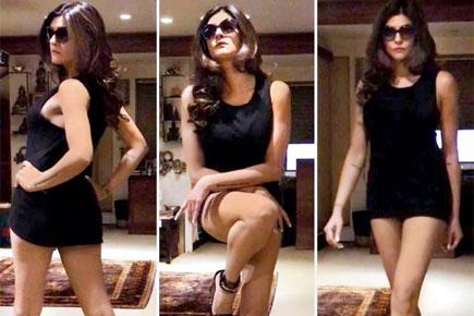 Sushmita Sen flaunts her toned legs in this little black dress