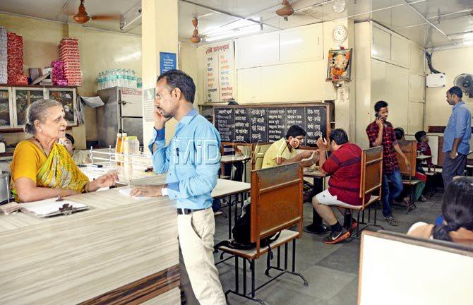 Seven-decade-old Tambe Arogya Bhuvan, helmed by 70-year-old Hemamalini Tambe, remains one of the few places that offers authentic Maharashtrian fare. Pic/Sneha Kharabe