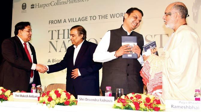 A M Naik, Mukesh Ambani and Devendra Fadnavis at the launch. Pic/Atul Kamble