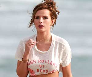 Bella Thorne poses with fake baby bump