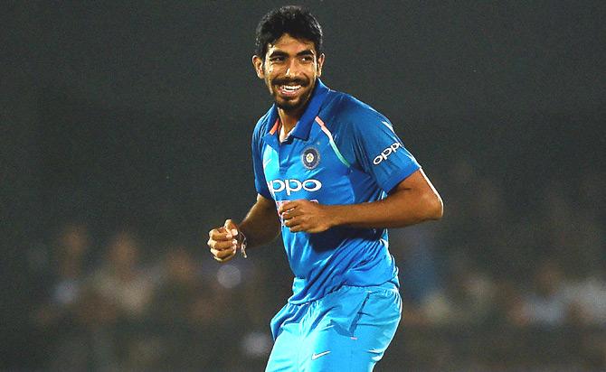 Indian cricketer Jasprit Bumrah celebrates the wicket of New Zealand cricketer Ross Taylor during the third One day international (ODI) cricket match between India and New Zealand at the Green Park Cricket Stadium in Kanpur on October 29, 2017. Pic/AFP