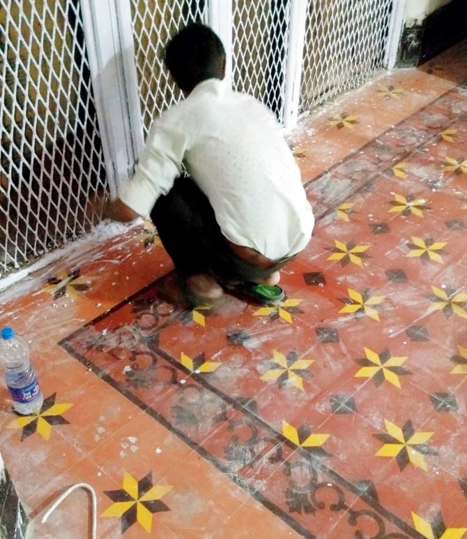 Workers carry out restoration work of the CST building as part of phase I of the project. File pics