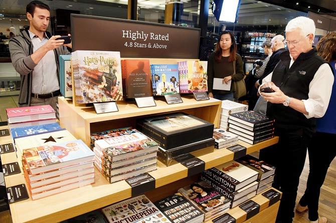 Customers browse the collection at Amazon Books