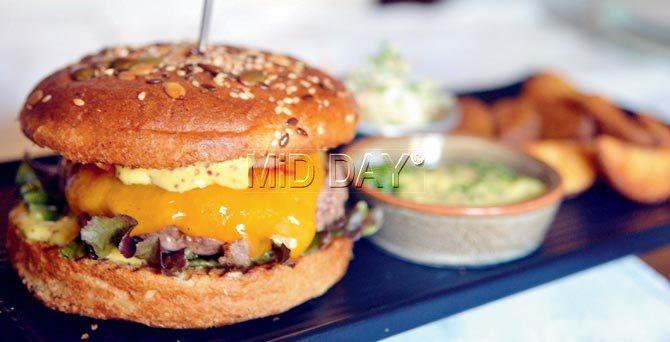 The Double Cheese Tenderloin burger at Woodside Inn, Lower Parel. Pic/Datta Kumbhar