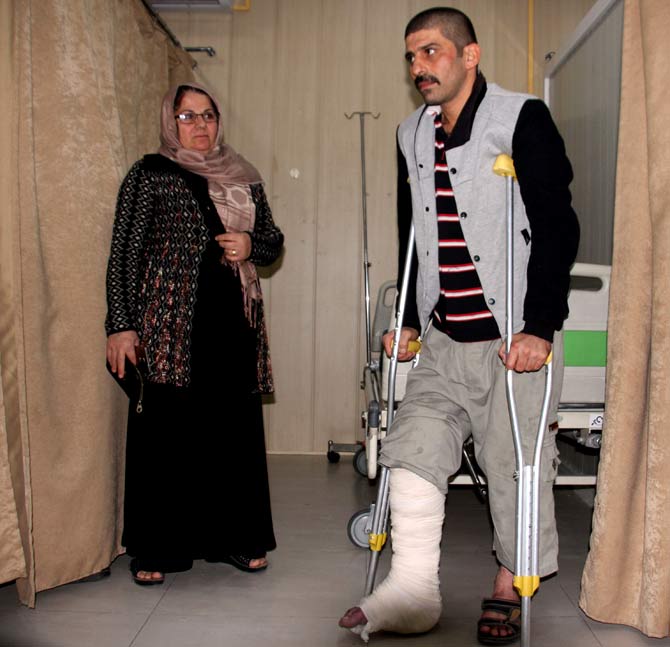 An earthquake victim is helped at Sulaimaniyah Hospital in Sulaimaniyah, Iraq. Pic/AFP