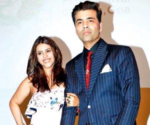 Karan Johar's floral tie and shoes need your attention!