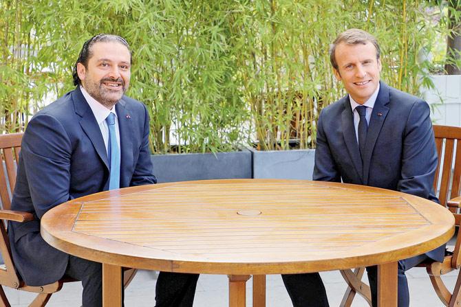 French President Emmanuel Macron with Lebanese Prime Minister Saad Hariri