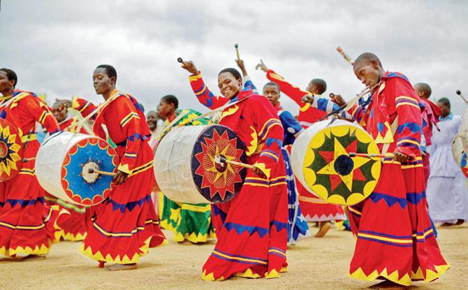 Members of the International Apostolic Ejuwel Jekenisheni Church dance, sing, pray, and play drums during a morning service at the open-air church on the outskirts of Harare on Sunday. Pic/AFP