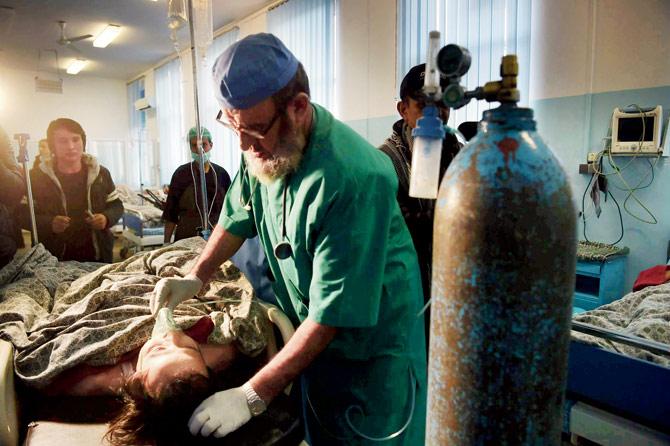 An Afghan journalist is treated at a hospital after the attack. Pic/afp