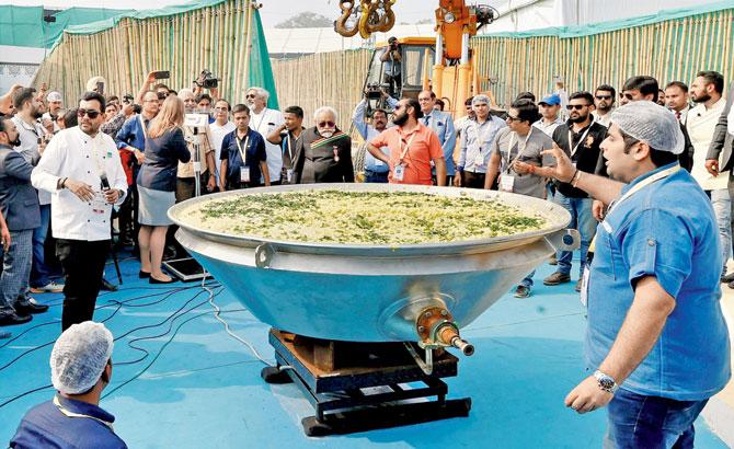 The khichdi was cooked in a giant wok in New Delhi. Pic/PTI