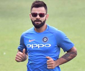 Virat Kohli shows caring side, rushes to help TV crew member hit by a ball