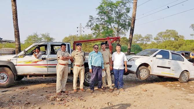 ACF Makrand Ghodke with forest officers Prashant Deshmukh and Mayur Bothe and Mangroves Cell members who seized the vehicles