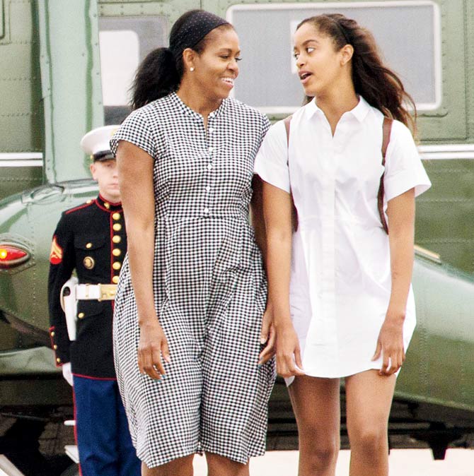 Former First Lady Michelle Obama with daughter Malia in 2016