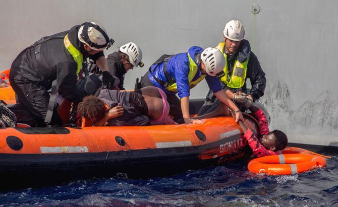 Migrants are rescued by members of German NGO Sea-Watch in the Mediterranean Sea on November 6, 2017. During a shipwreck, five people died, including a newborn child. According to the German NGO Sea-Watch, which has saved 58 migrants, the violent behavior of the Libyan coast guard caused the death of five persons. Pic/AFP