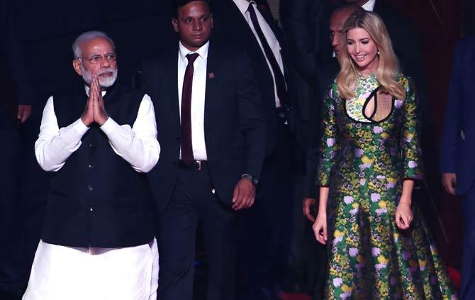 Indian Prime Minister Narendra Modi (L) and Advisor to US President Ivanka Trump (R) arrive at the Global Entrepreneurship Summmit at the Hyderabad convention centre (HICC) in Hyderabad. Pic/AFP