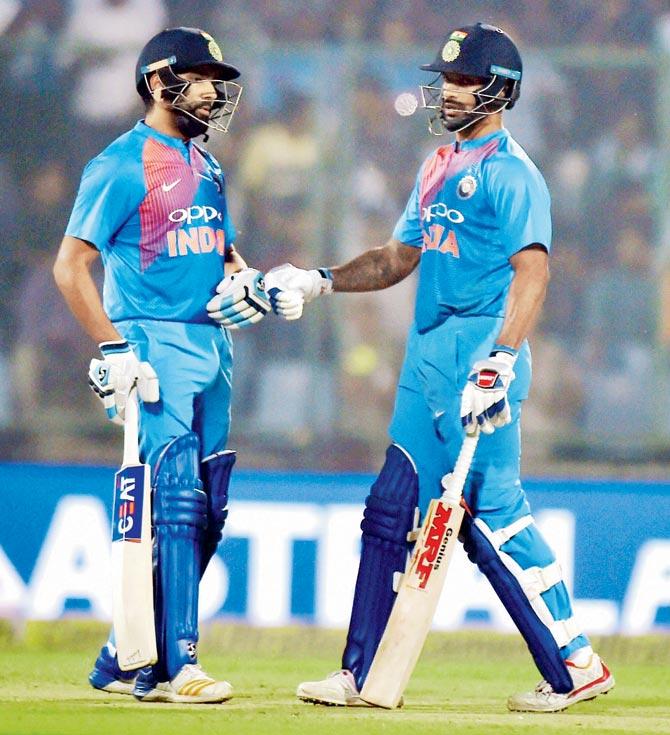 Indian openers Rohit Sharma (left) and Shikhar Dhawan put on a 158-run opening stand against  New Zealand in the first T20 at the Ferozshah Kotla stadium in New Delhi yesterday. Pic/PTI