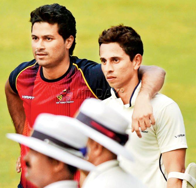 Mumbai skipper Aditya Tare (left) with Lad