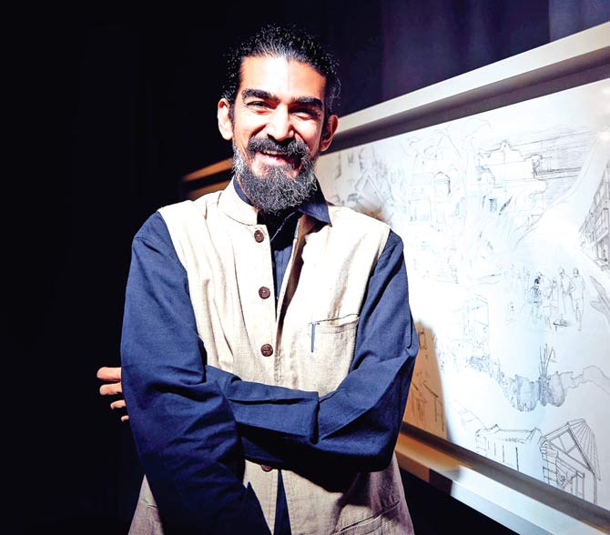 Ranjit Kandalgaonkar with his drawing at Wellcome Collection, London