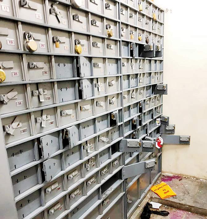 The crooks looted 30 lockers after tunneling through the floor of the locker room at the Juinagar branch of Bank of Baroda