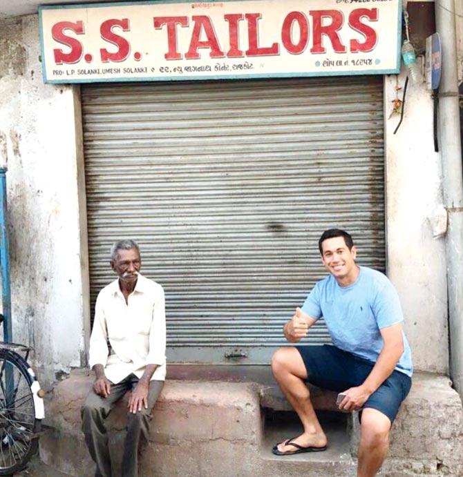 New Zealand batsman Ross Taylor outside a tailor shop in Rajkot