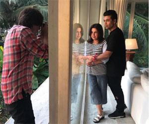 SRK turns photographer for Farah Khan and Karan Johar at his pre birthday bash