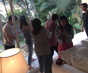 Shah Rukh Khan's guests are hooked to their phones at his pre-birthday bash