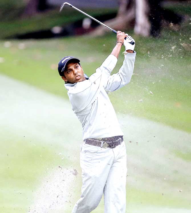 SSP Chawrasia hits a shot on the 18th hole on Saturday