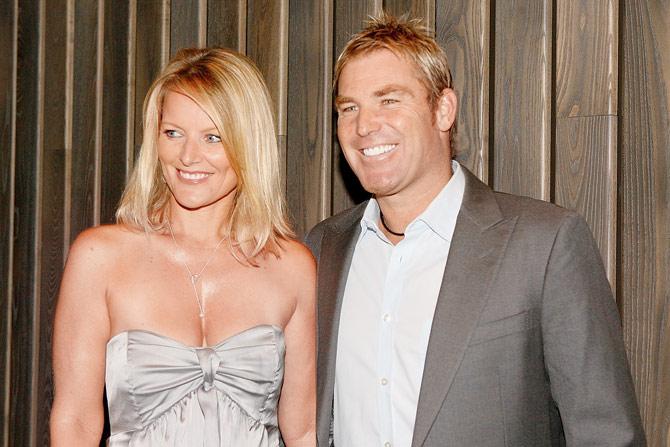 Shane Warne with ex-wife Simone in 2010. Pics/AFP, Getty Images 