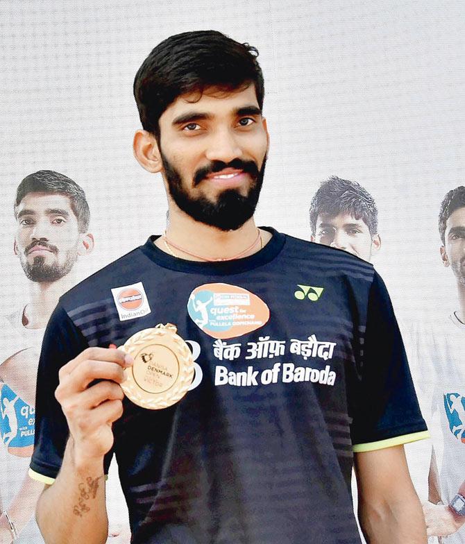 Srikanth poses with his Denmark Open Super Series gold medal in Hyderabad yesterday. Pic/PTI