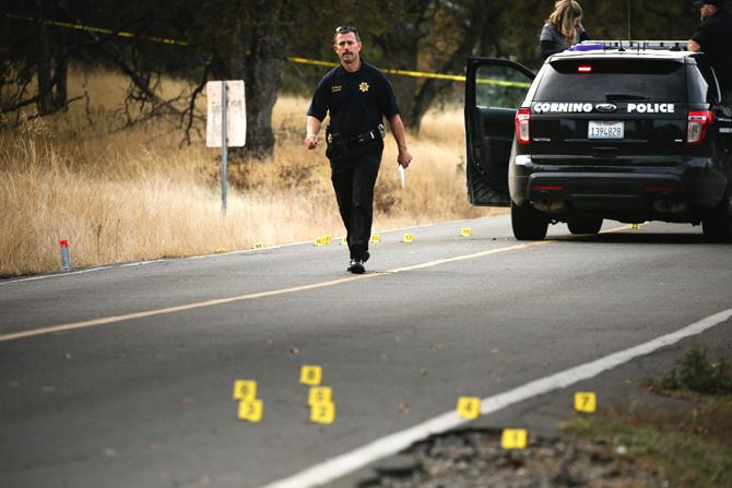 A law enforcement officer is seen at one of many crime scenes after a shooting on November 14, 2017, in Rancho Tehama, California Four people were killed and nearly a dozen were wounded, including several children, when a gunman went on a rampage at multiple locations, including a school in rural northern California. Pic/AFP