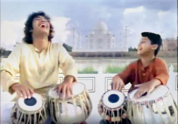 A still from the commercial featuring Ustad Zakir Hussain and young Aditya