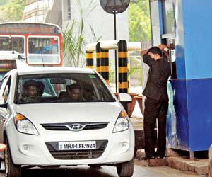 Electronic Toll Collection mechanism at all toll plazas from December: Gadkari