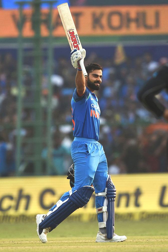 This file photo taken on October 29, 2017 shows Indian captain Virat Kohli after hitting his century (100 runs) during the third one day international (ODI) cricket match between India and New Zealand at the Green Park Cricket Stadium in Kanpur. Virat Kohli reclaimed the throne as the world