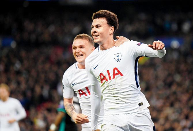 Dele Alli (right) celebrates Tottenham