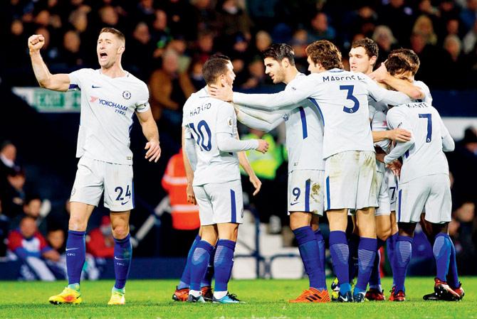 Chelsea players celebrate a goal against West Brom during a Premier League match at The Hawthorns on Saturday. Pic/AFP