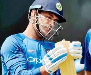 Is MS Dhoni dropped down the order in T20s for his lack of firepower?