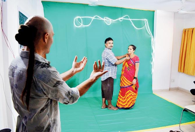 Artist Patrick Dionne instructs the couple during the photo shoot at  What About Art in Bandra. Pics/Ashish Raje 