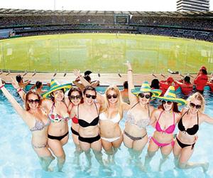 Bikini-clad fans can enjoy alcohol and a swim at this cricket stadium