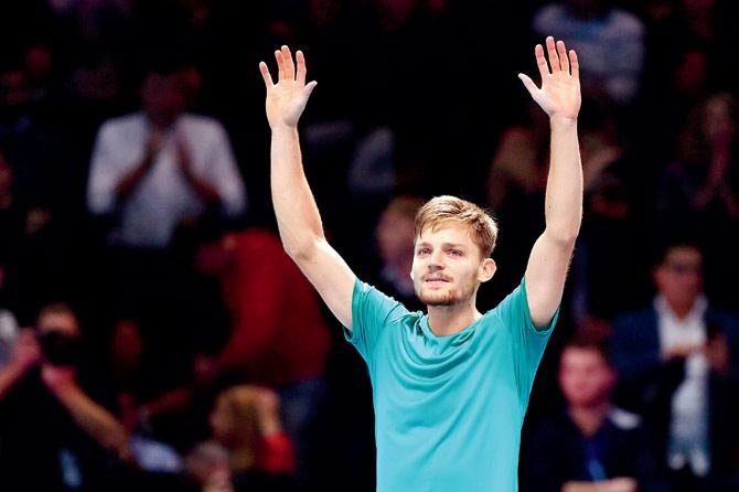 Belgium’s David Goffin celebrates after beating Roger Federer during their ATP Finals semi-final clash in London on Saturday. Pic/AFP 