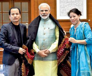 Photo: When Narendra Modi met Mary Kom and her husband