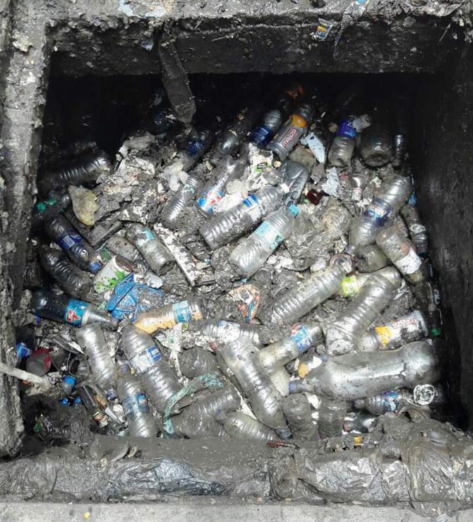 Plastic bottles clog a drain