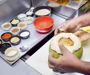 Popular Mumbai chef teaches the art of cooking biryani inside a tender coconut